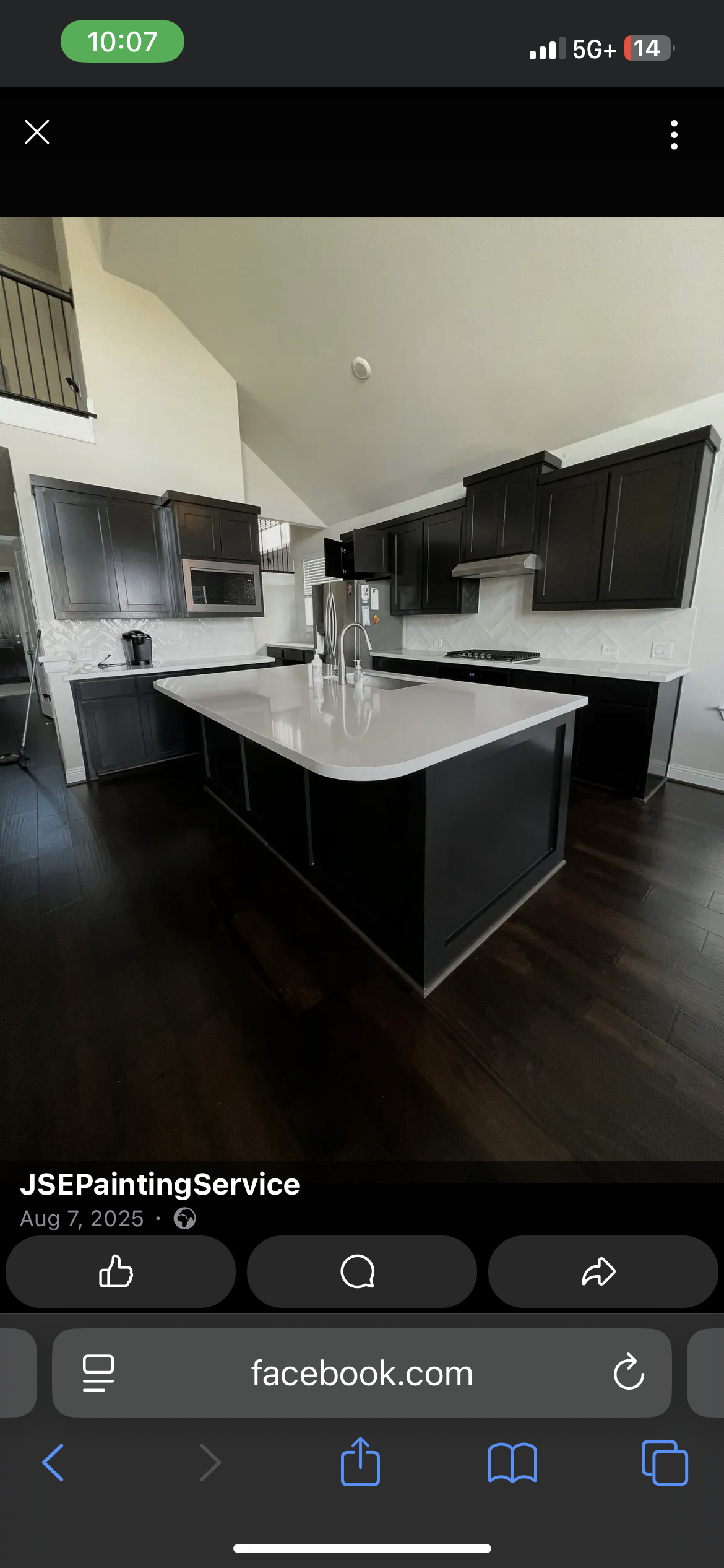 Charcoal cabinets with bright island — modern remodel